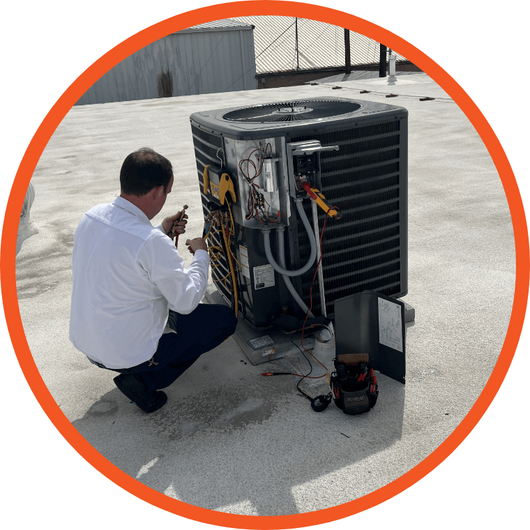 man working on an HVAC unit