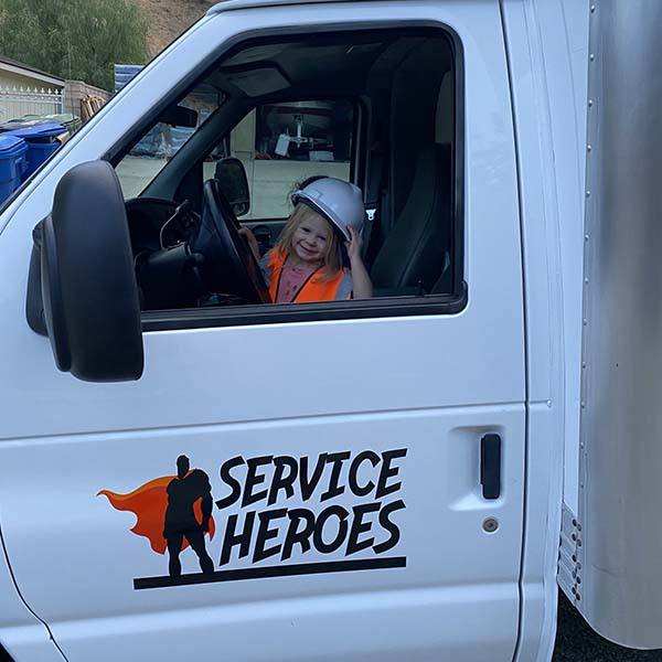 little girl in company van