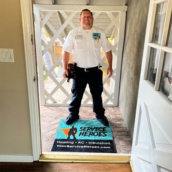 worker in front of carpet